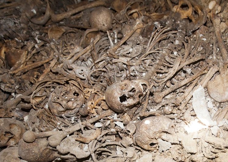 A picture taken on May 31, 2013 shows human skeletons in a mass grave that has been found at a cemetery in the Jaffa district of Tel Aviv, Israel. An official at the Muslim cemetery there told AFP that the grisly find occurred on May 29, 2013 when ground subsided as workers carried out renovations, revealing six chambers full of skeletons, thought to be the remains of dozens of Palestinians killed during the Israeli-Arab war of 1948, when the Jewish state was founded. Jaffa was at the time a Palestinian town but there was an exodus of most of its Arab population when it fell to the fledgling Israeli army and right-wing Jewish militias.    AFP PHOTO/AHMAD GHARABLIAHMAD GHARABLI/AFP/Getty Images